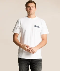 Tops|Graphic T-Shirts | tee luv Modelo Emblem T-Shirt White